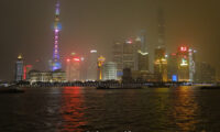 Shanghai skyline and the Oriental Pearl at night.