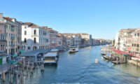 Wide shot of main Venice canal with buildings on either side