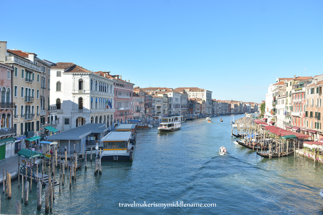 Wide shot of main Venice canal with buildings on either side