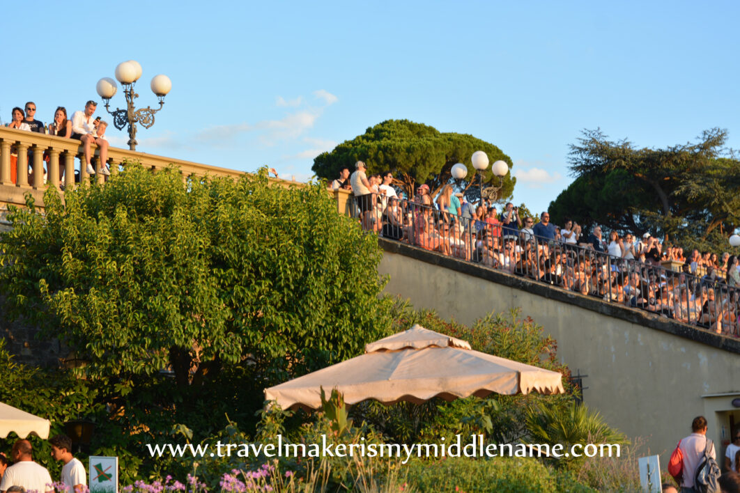 The cafe and people sitting on the steps at the Piazzale Michelangelo, Florence, Italy. Photo copyright and credit: Author