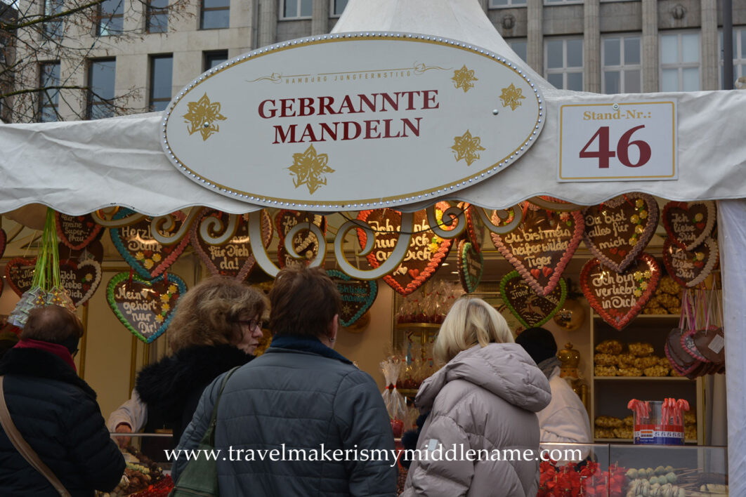 A stall selling roasted almonds and gingerbread biscuits