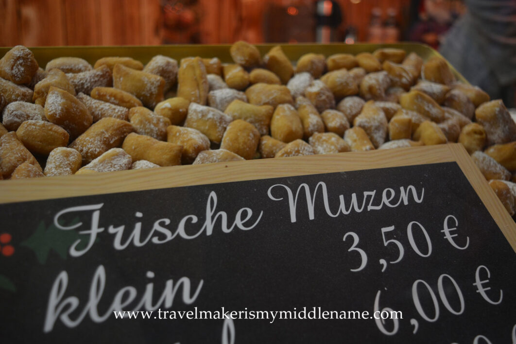 Fresh muzen, a type of chunks of donuts, like donut holes, dusted with icing sugar.