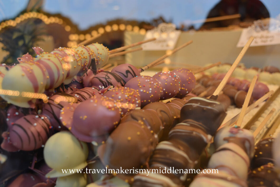 Chocolate covered fruit in white, milk, dark and pink chocolate