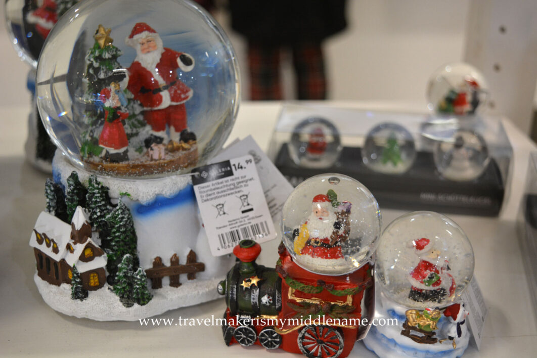 Snow globes in a shopping center, the large one is 14.99€