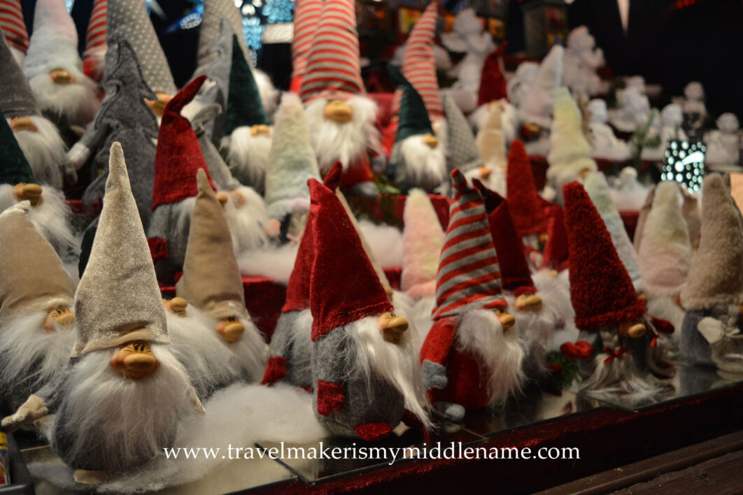 Nisse (Danish) or Wichtel (German) Christmas figurines with felt hats. They are small benevolent but prankster beings that look like gnomes with large round noses, white beards and a large pointy hat that is as talls they are, and covers their noses.