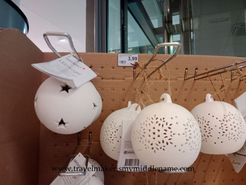 Light up battery powered LED Christmas ceramic bauble lights with various designs cut into the bauble (stars, snow flakes)