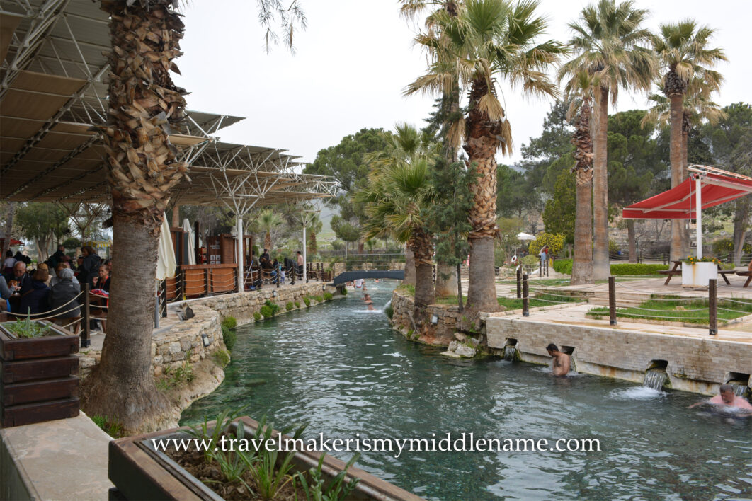 People bathing in the Pamukkale Antique Pool, also called Cleopatra Pool, in Pamukkale, Türkiye.