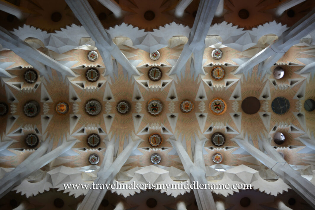 A worm's eye view of the white columns inside La Sagrada Familia church in Barcelona, Spain.