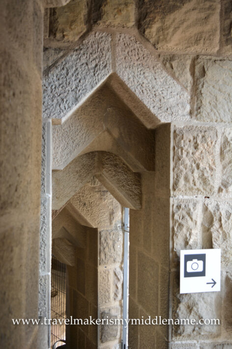 Narrow dooways at the top of the Passion tower of La Sagrada Familia church in Barcelona, Spain, laading visitors to lookouts for photography spaces.