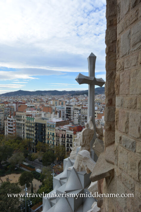 The white cross in the Passion tower of La Sagrada Familia church in Barcelona, Spain as seen from inside the tower though a window around 90m.