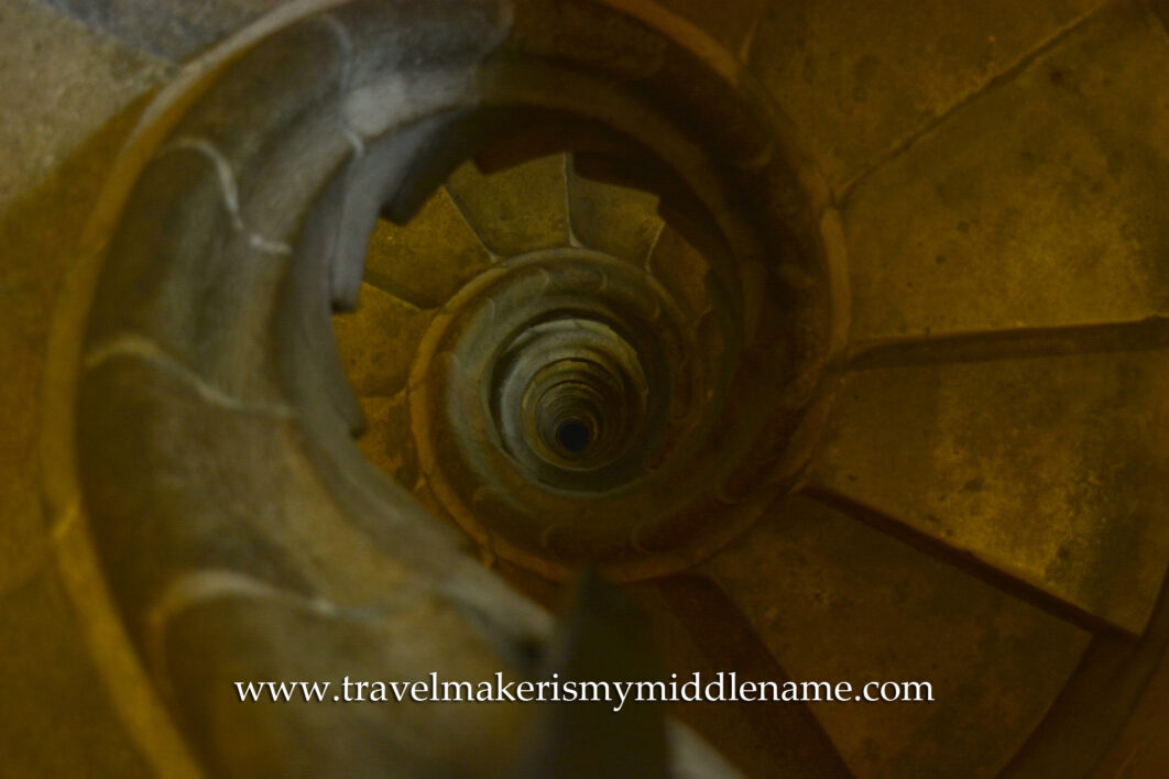 The downwards and anti-clockwise spiralling stone staircase that visitors to the tower descend from upon exit.